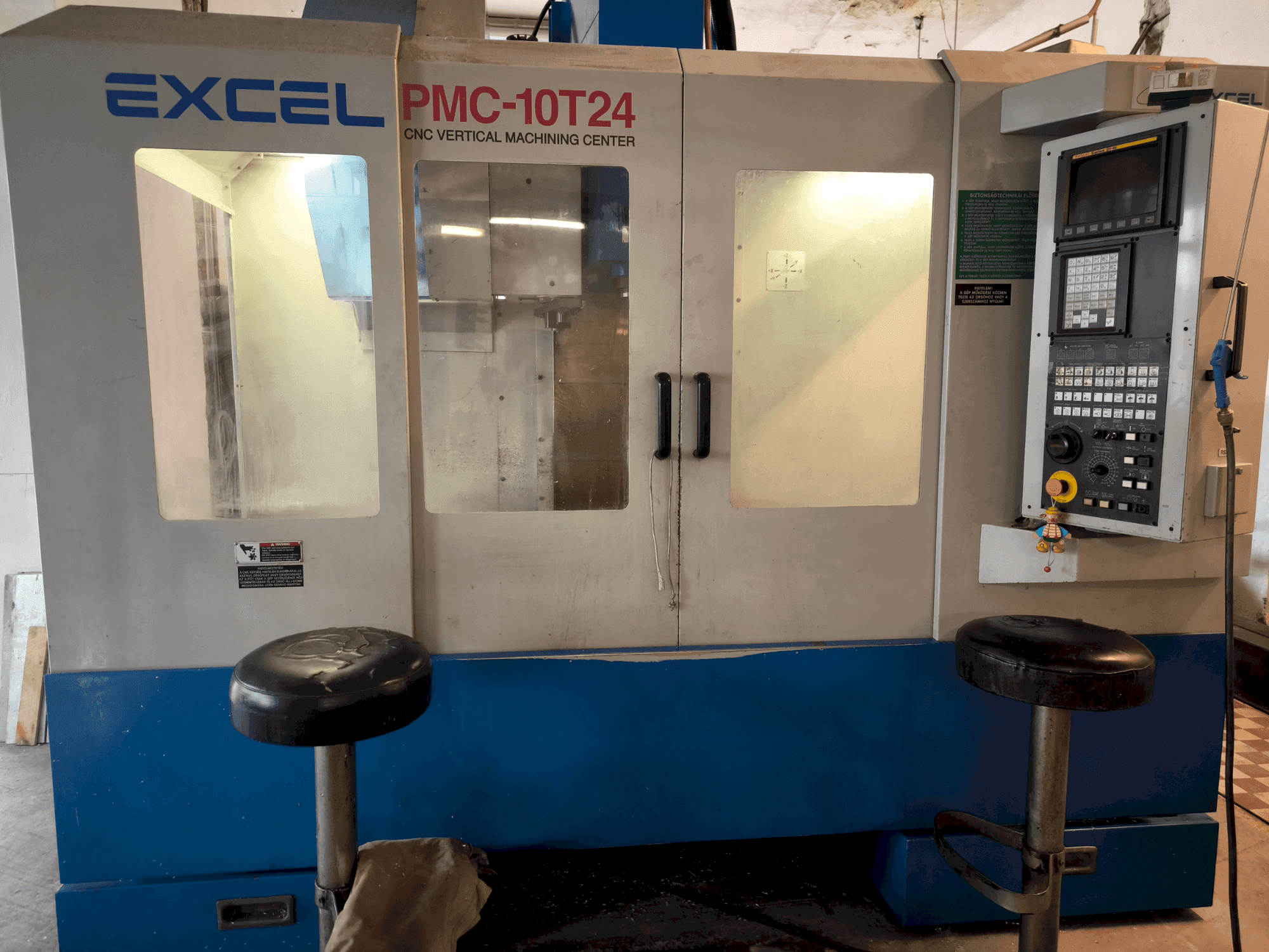 Front view of Excel  Excel PMC 10T24 (2004)  machine