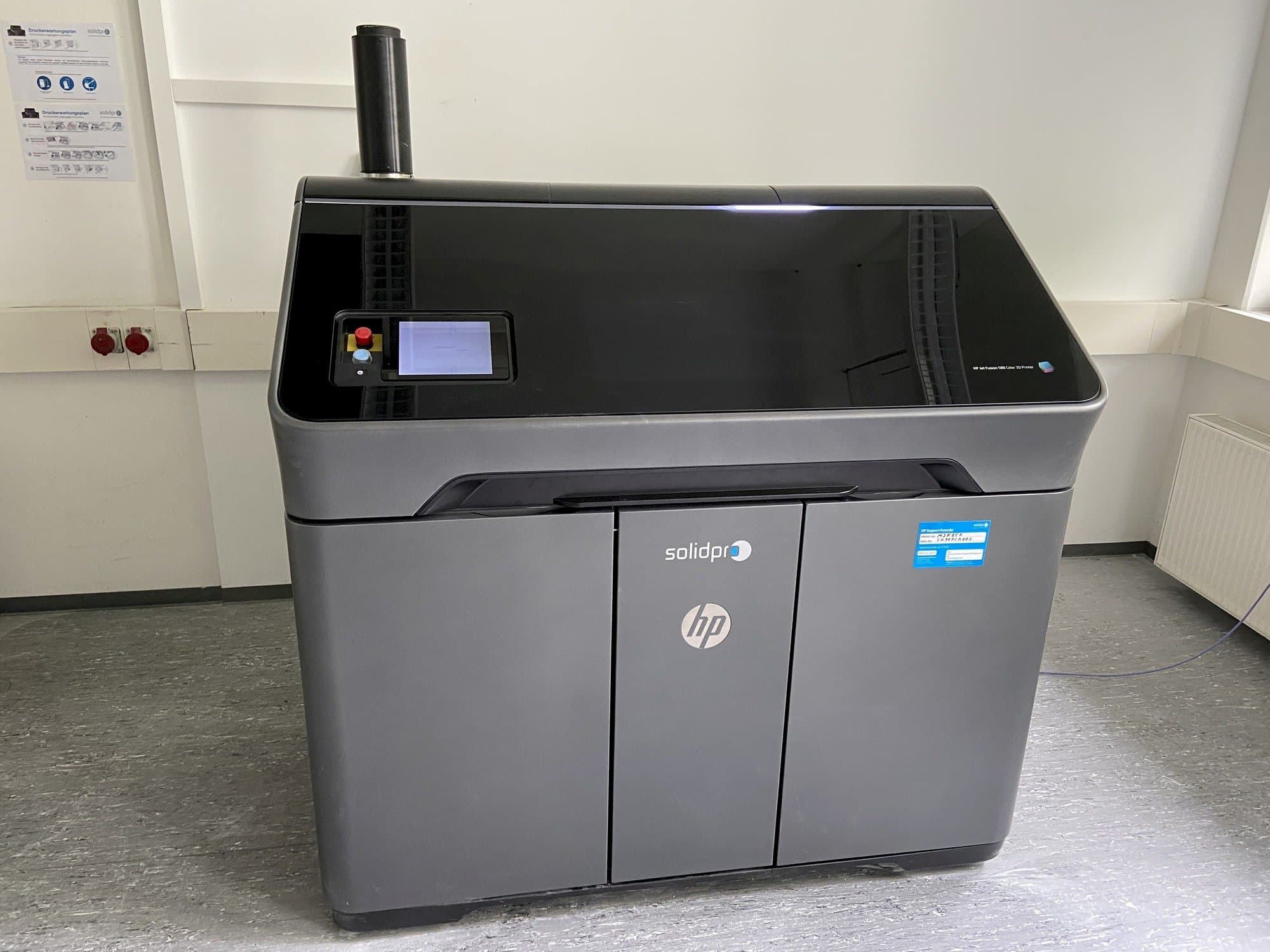 Front view of HP Jet Fusion 580 Color 3D printer  machine