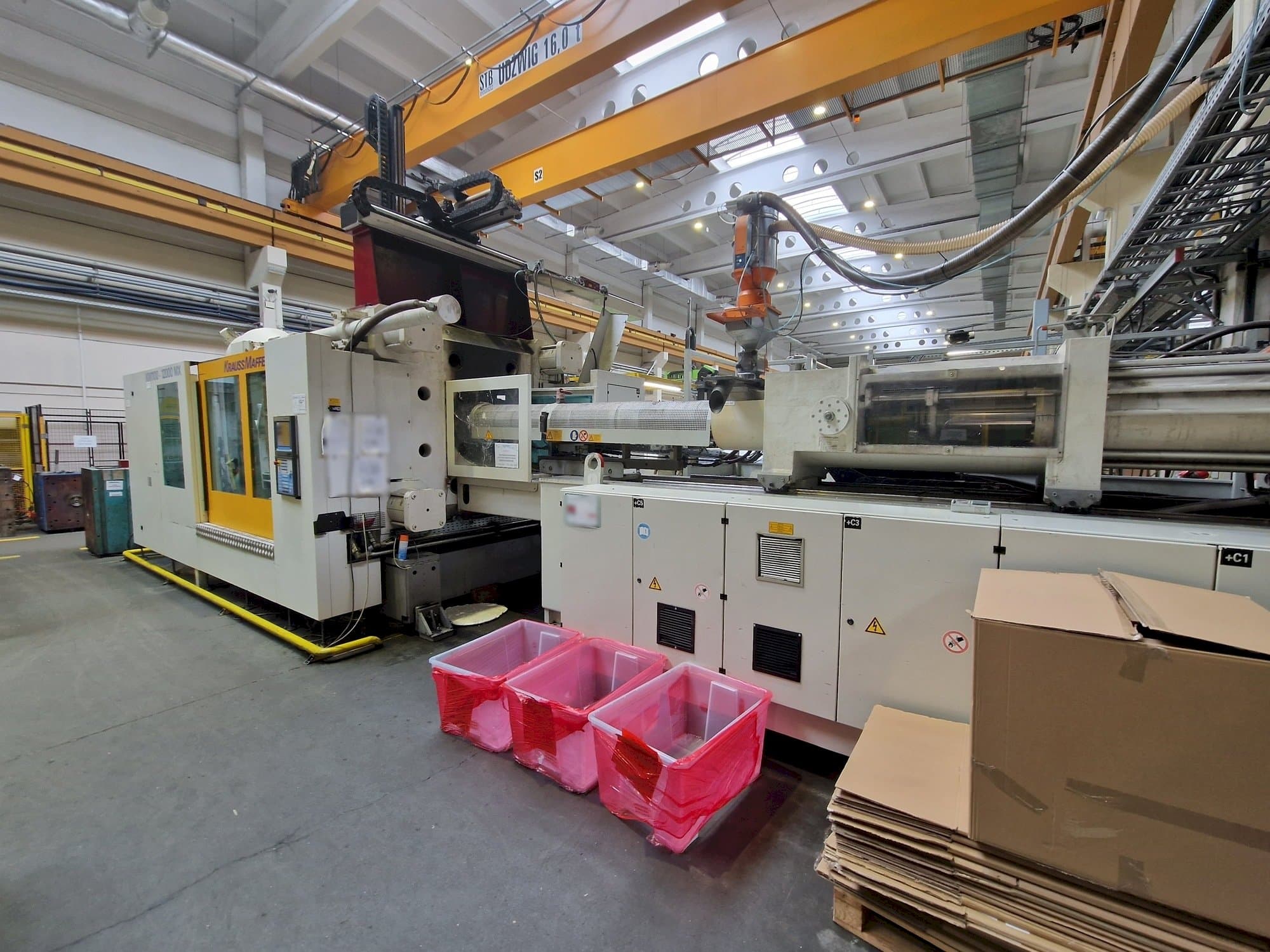 Front view of Krauss Maffei 1100-12000 MX  machine