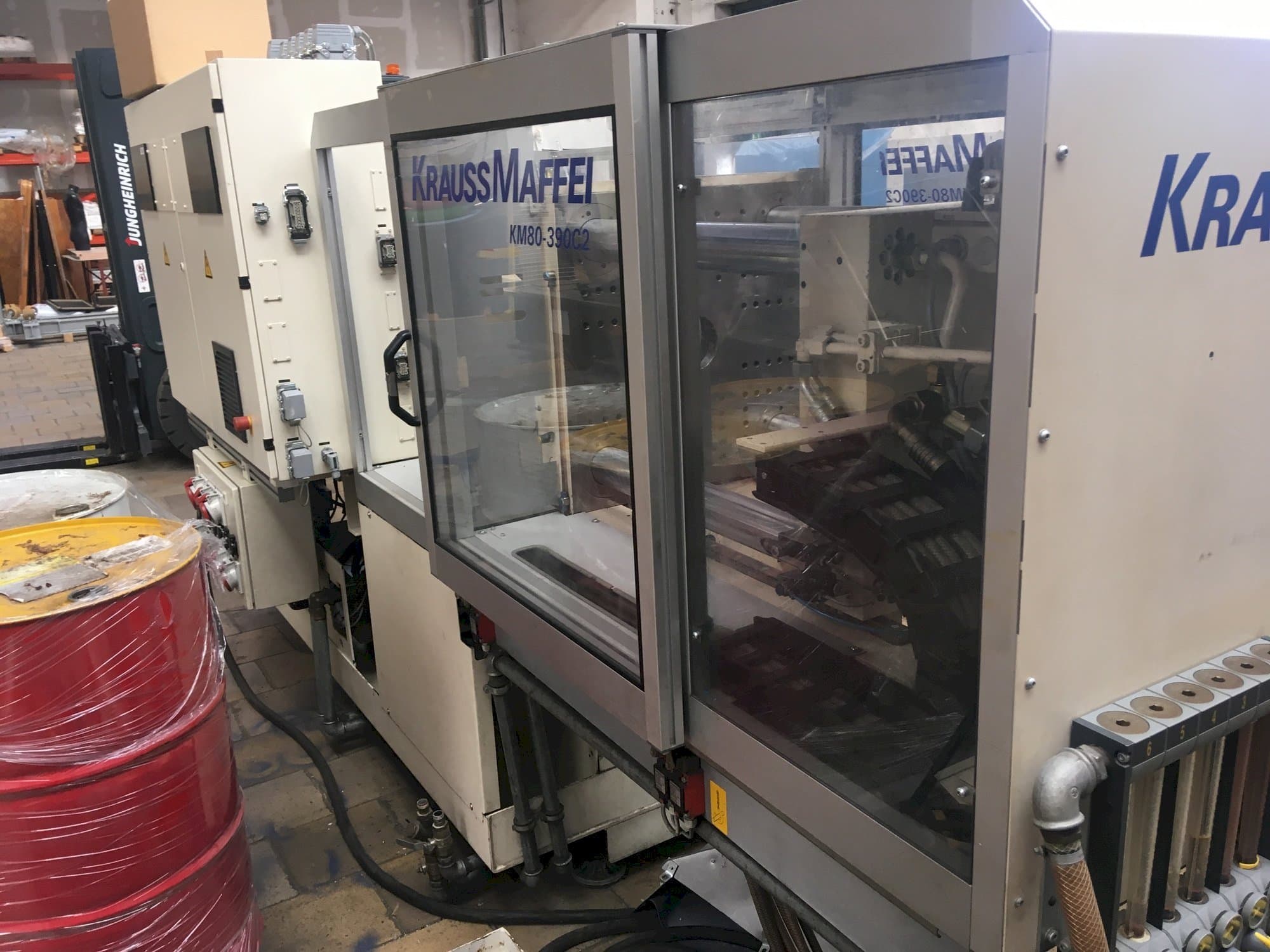 Right view of Krauss Maffei 80/390 C2  machine