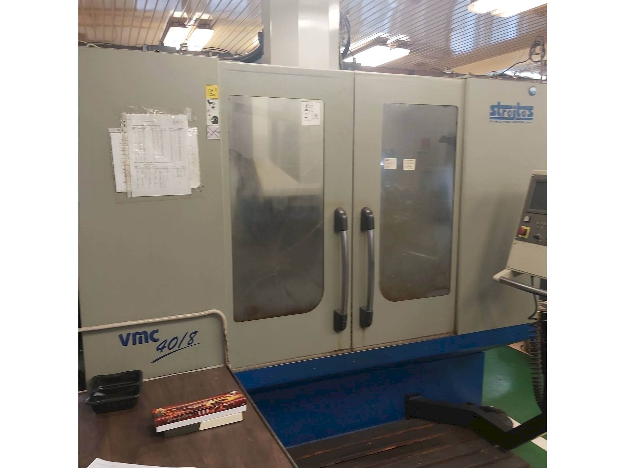 Front view of Strojtos  VMC 40/8  machine