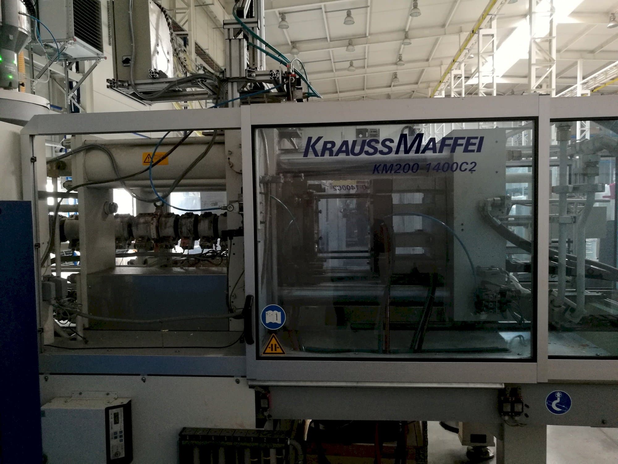 Front view of Krauss Maffei 200-1400 C2  machine