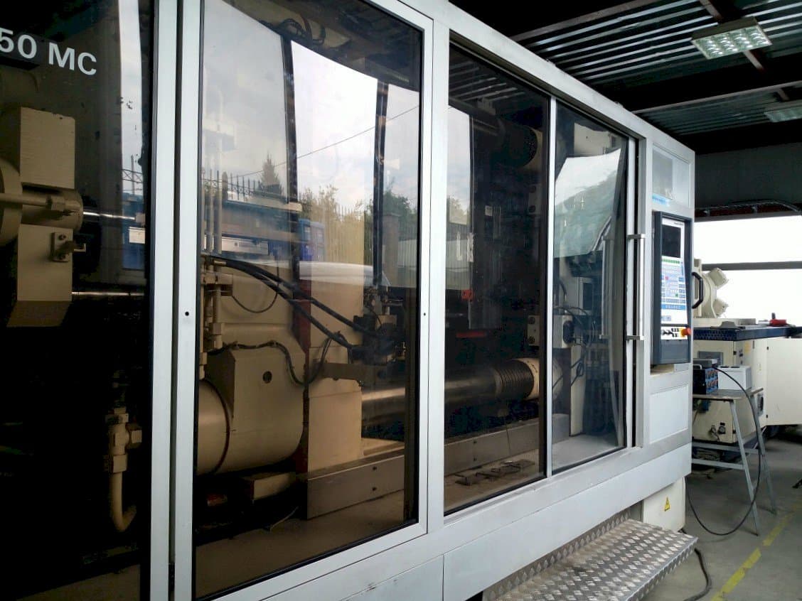 Front view of Krauss Maffei KM 800/1330 MC  machine