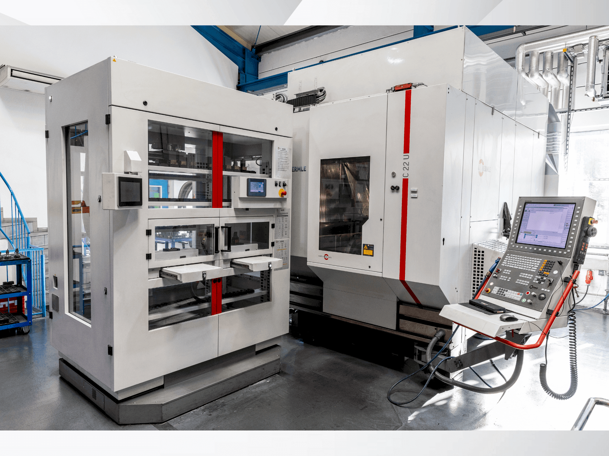 Front view of HERMLE C22 with handling system IH30  machine