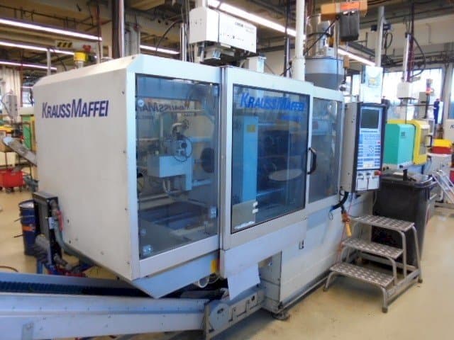 Left side view of Krauss Maffei KM 65-390-C2  machine