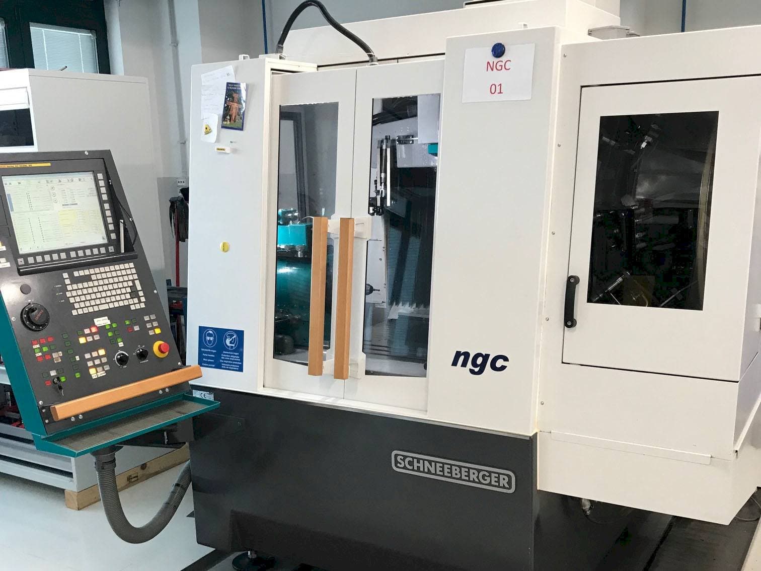 Front view of Schneeberger NGC  machine