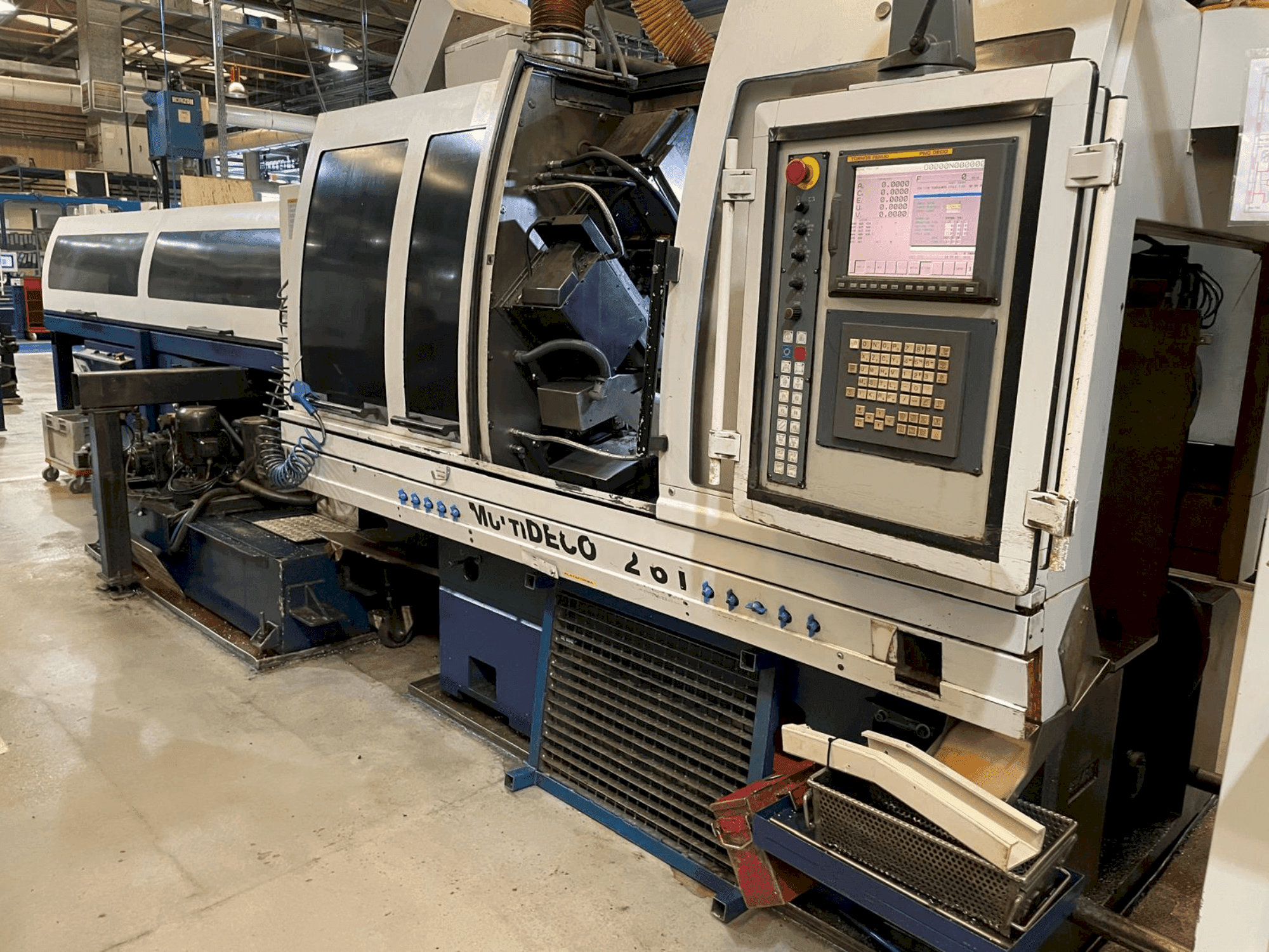 Front view of TORNOS MultiDeco 32-6i  machine