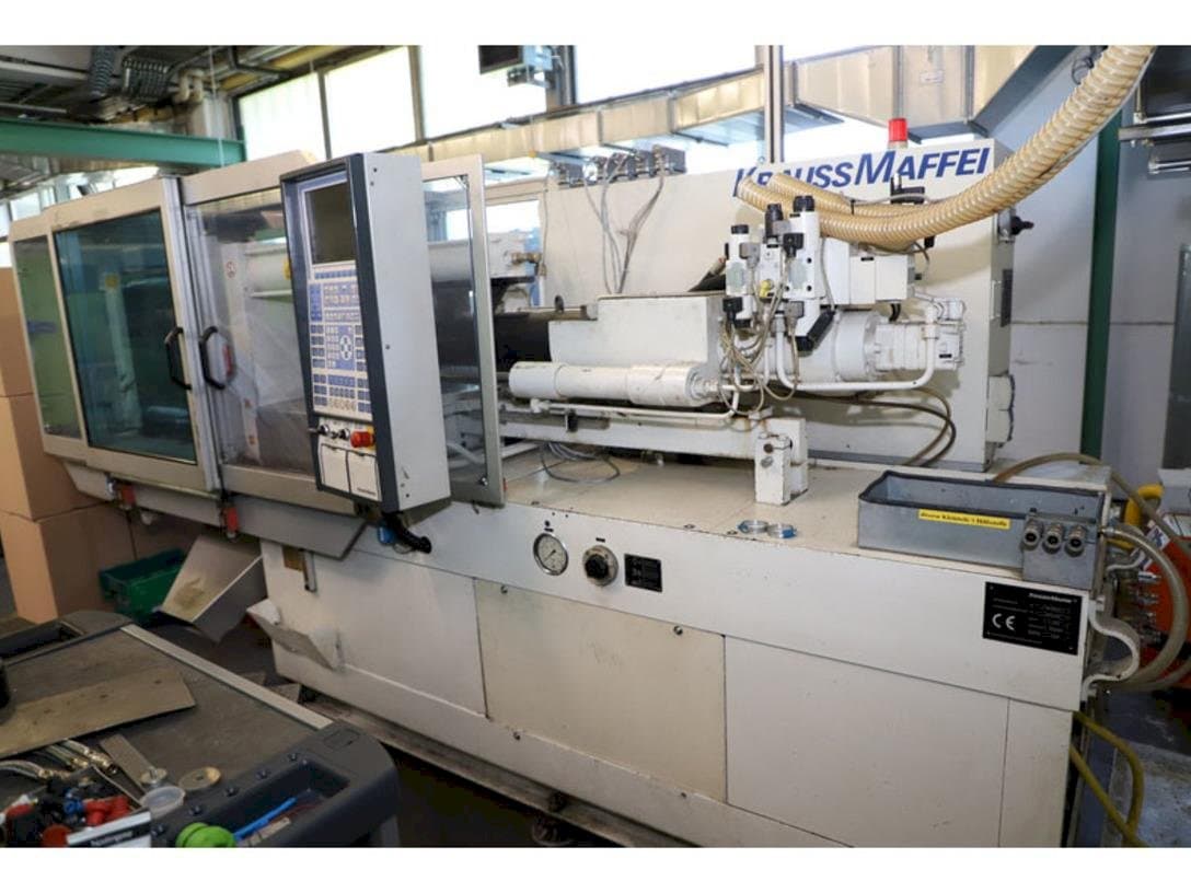 Right side view of Krauss Maffei 65-220 C1  machine