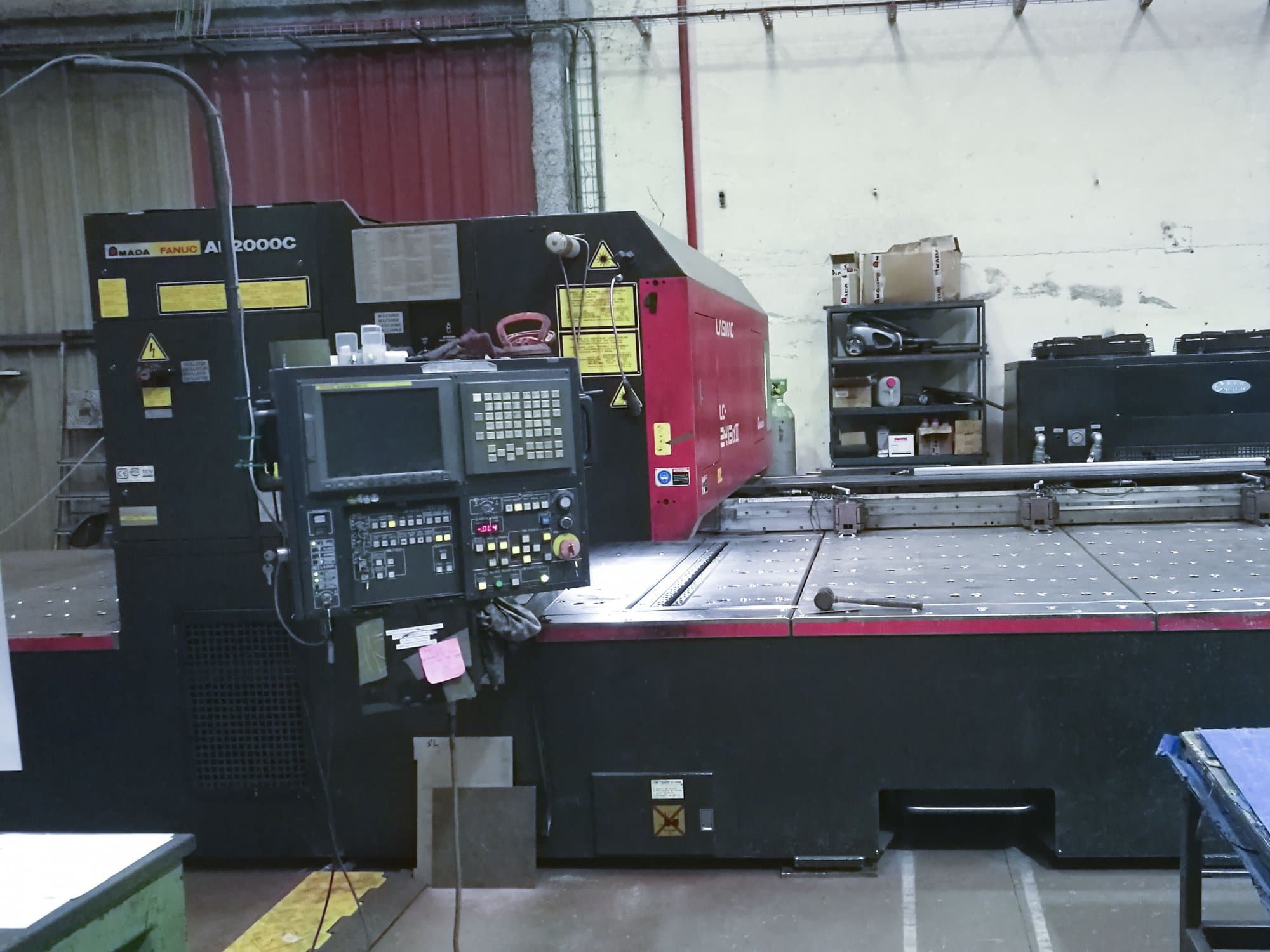 Front view of AMADA LC 2415 α3 Machine