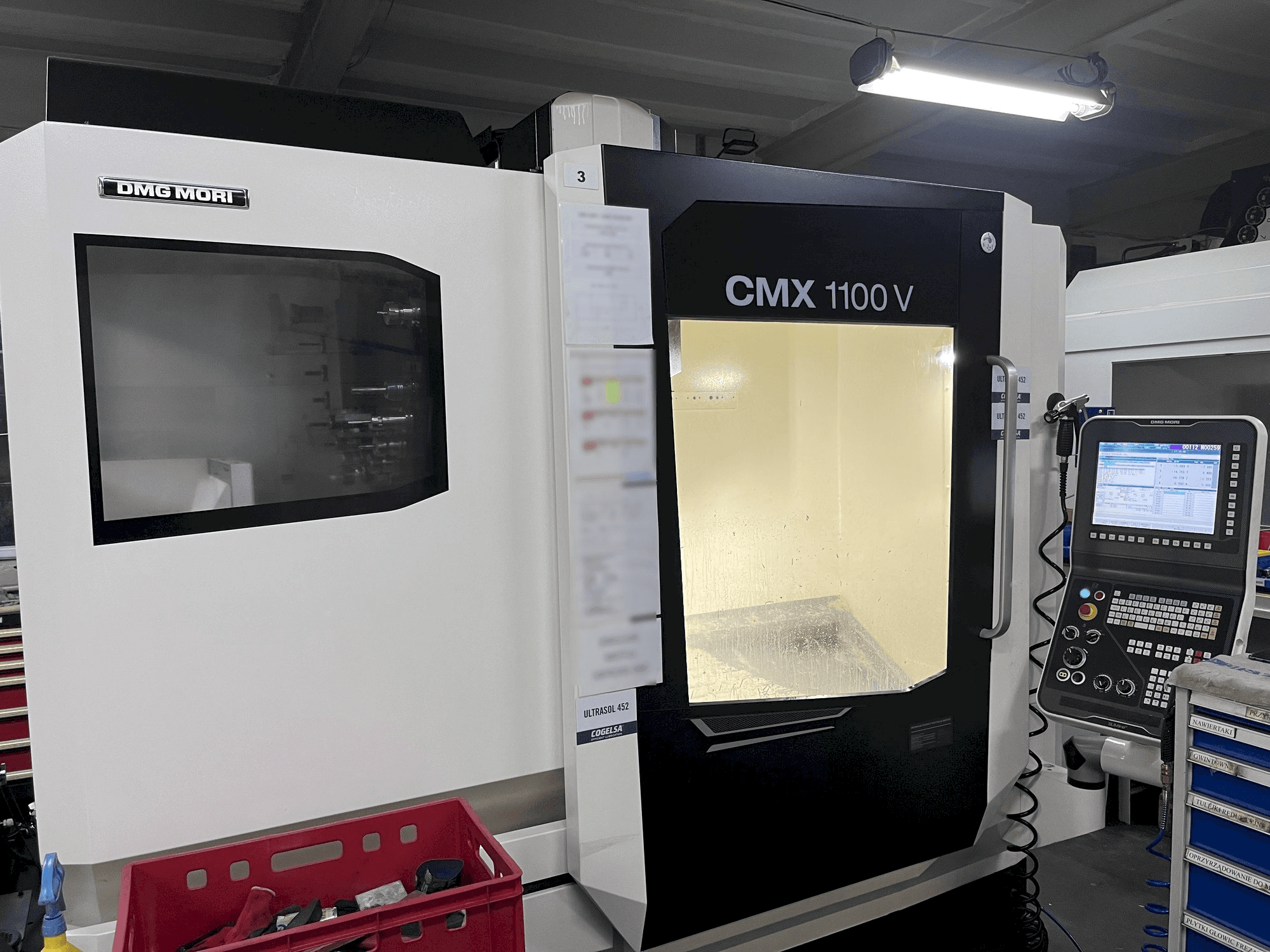 Left side view of DMG MORI CMX 1100 V machine