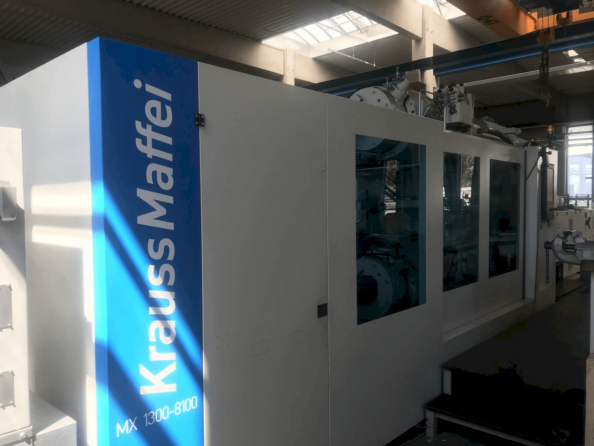 Front view of Krauss Maffei 1300-8100 MX machine
