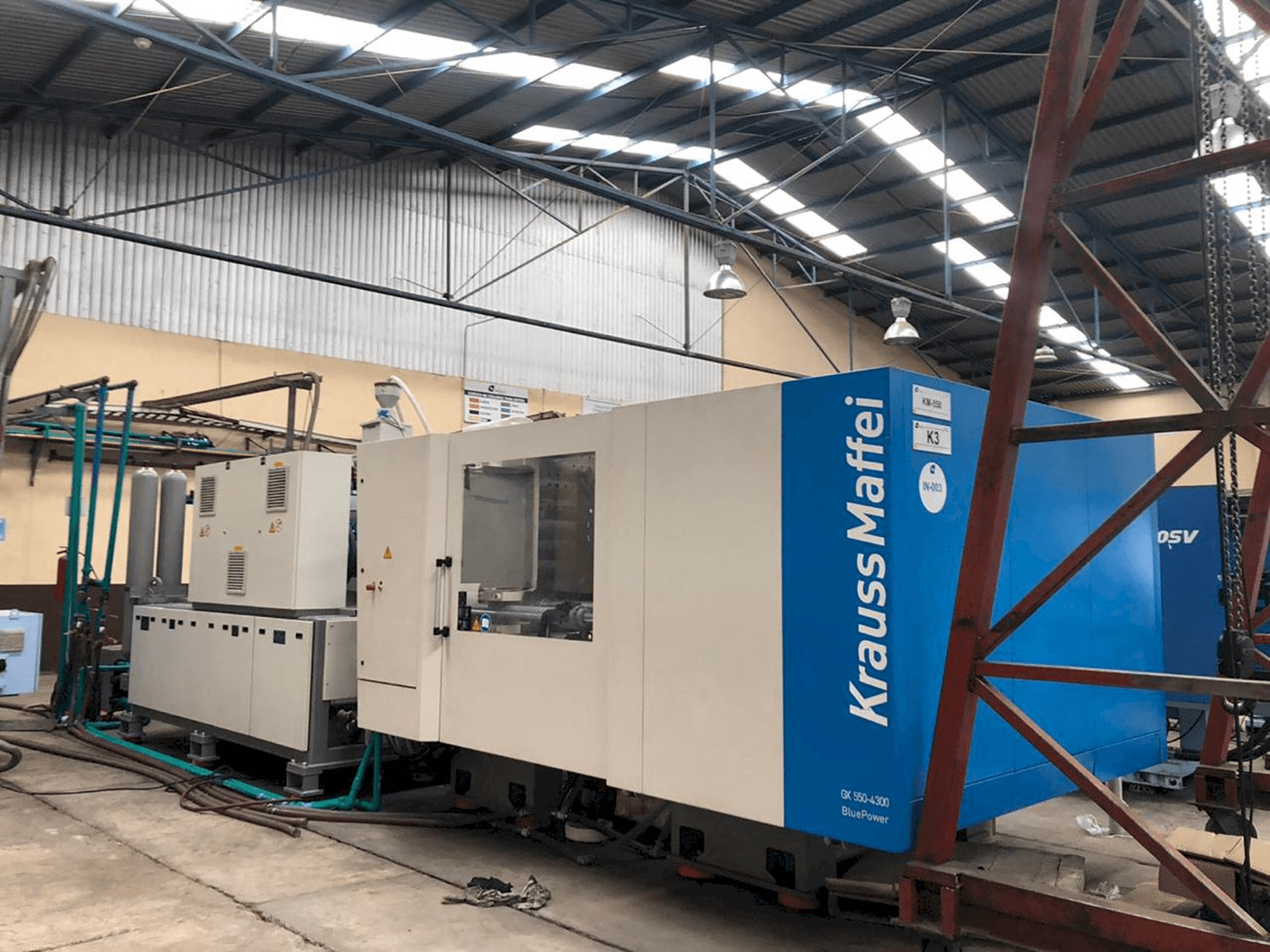 Front view of Krauss Maffei 550-4300 GX machine